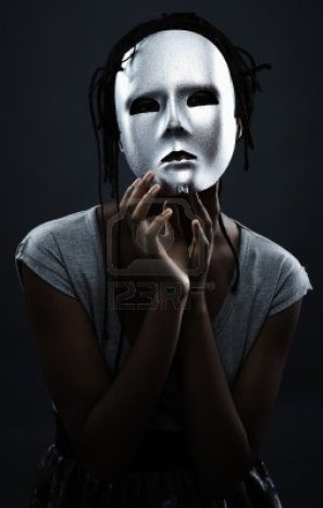 7874894-gloomy-woman-in-silver-mask-posing-on-a-black-background